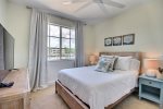 Guest bedroom 1, queen bed, marina view, separate exterior entrance